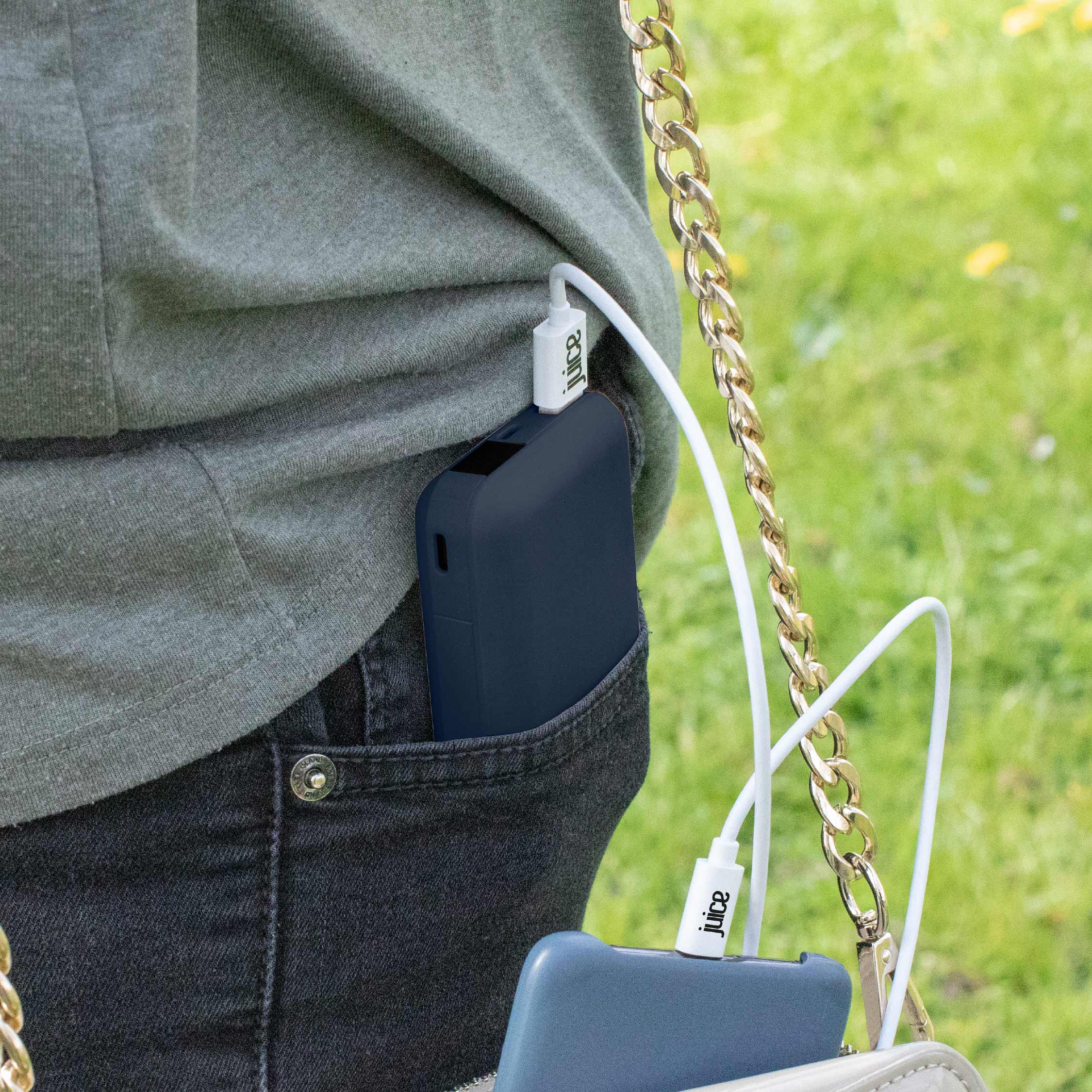 Juice 3 Charge Portable Power Bank in Navy in Jeans Pocket connected to iPhone.