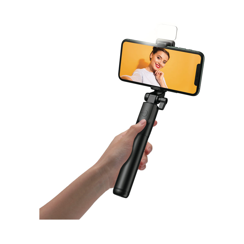 Juice Social 4 in 1 Selfie Stand held in hand, Selfie Light On, with phone held horizontally in C Clamp.