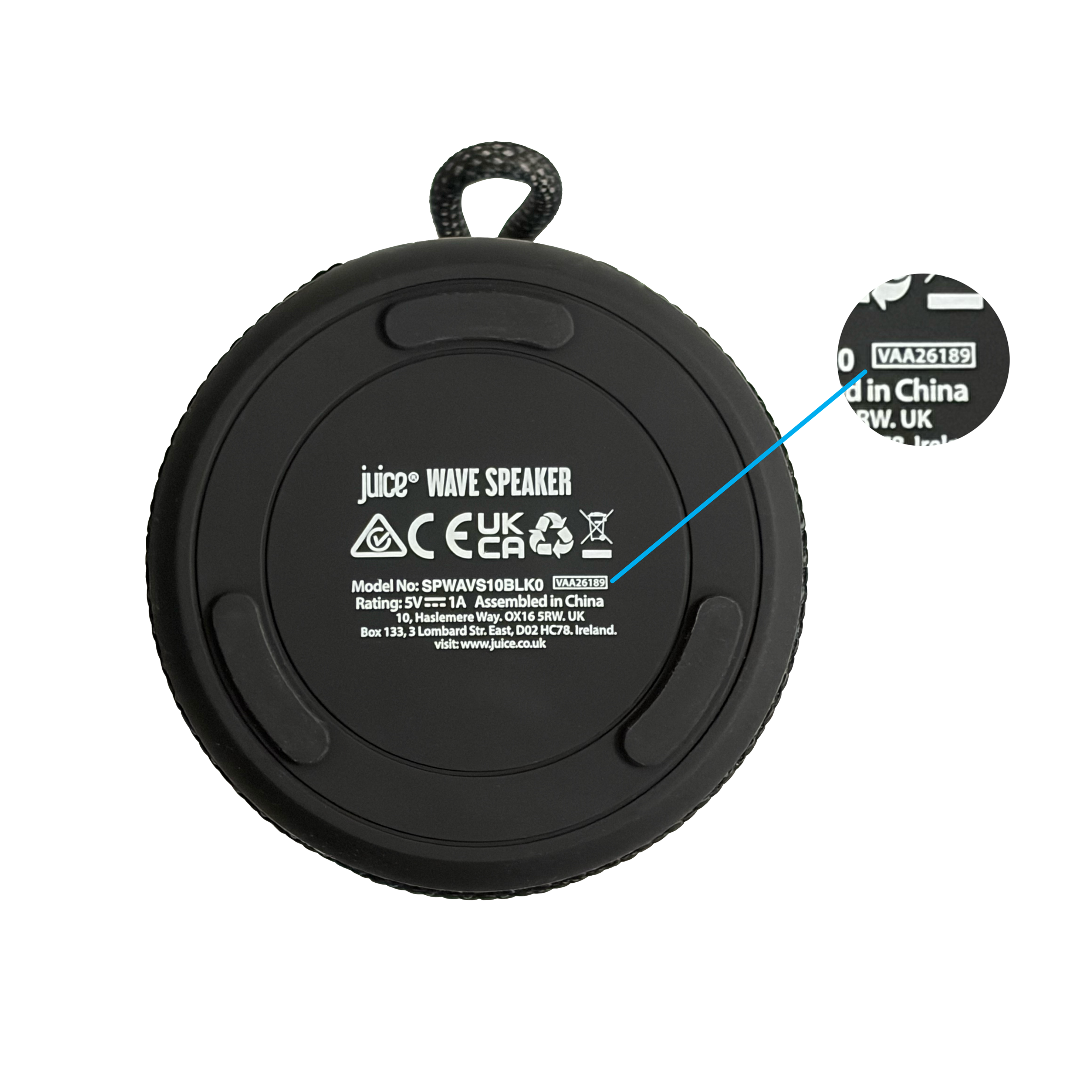 Underside of a speaker with a close-up showing the batch code on its label