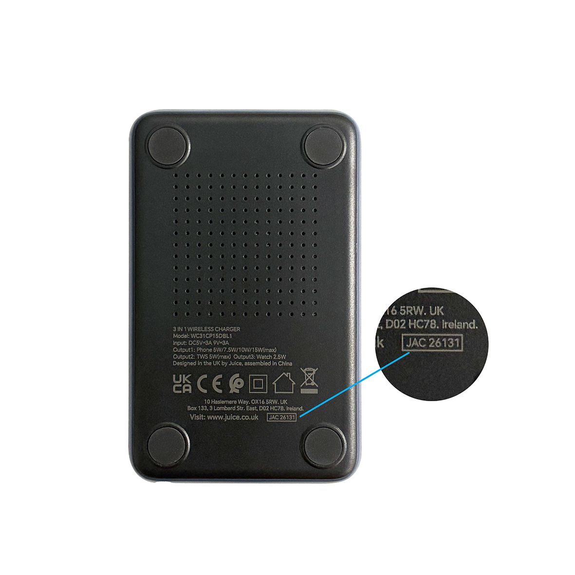 Underside of a 3-in-1 wireless charger with a close-up showing its batch code